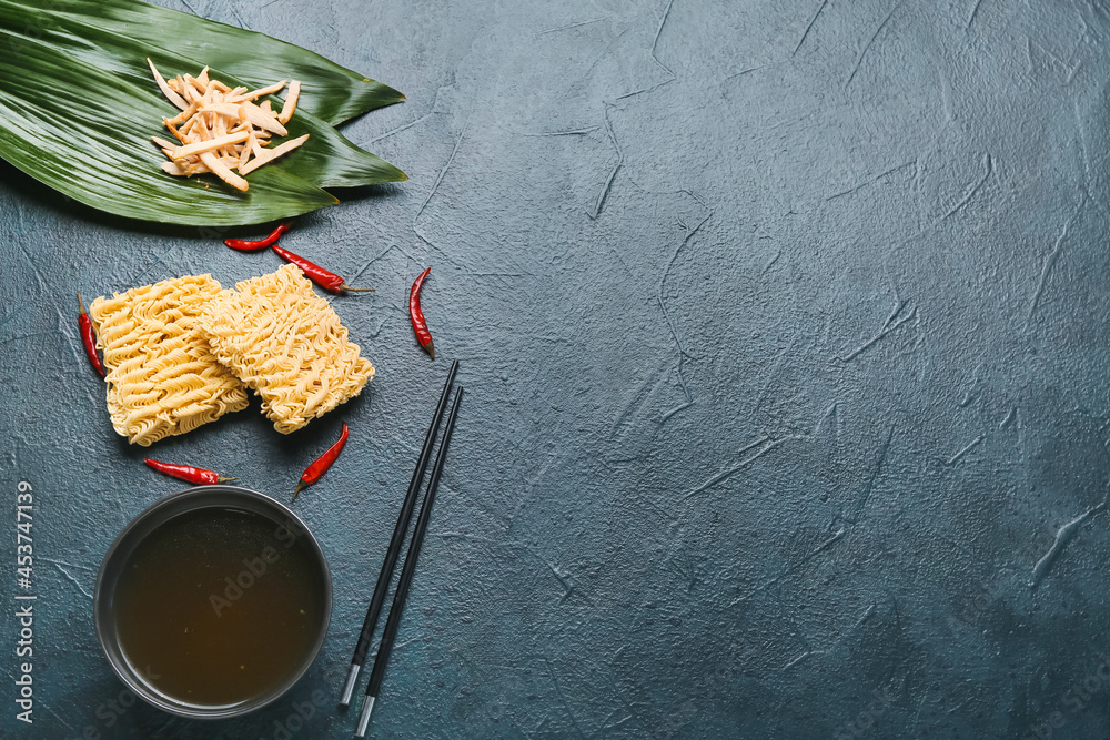 Ingredients for tasty Thai soup on dark background