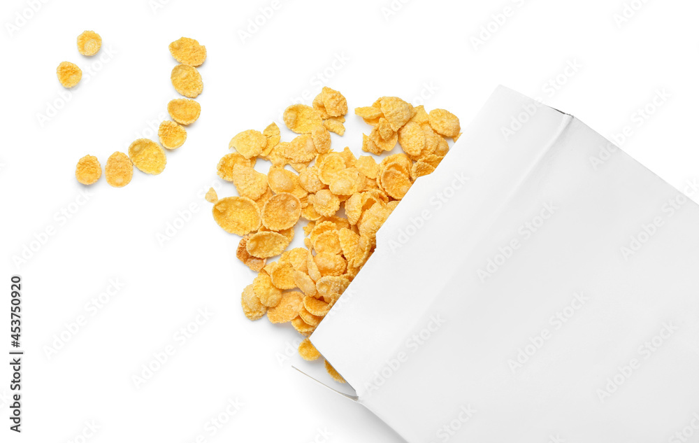 Smile made of tasty cornflakes on white background