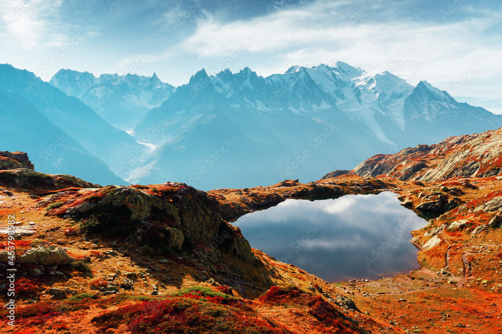 Colourful sunset on Chesery lake in France Alps