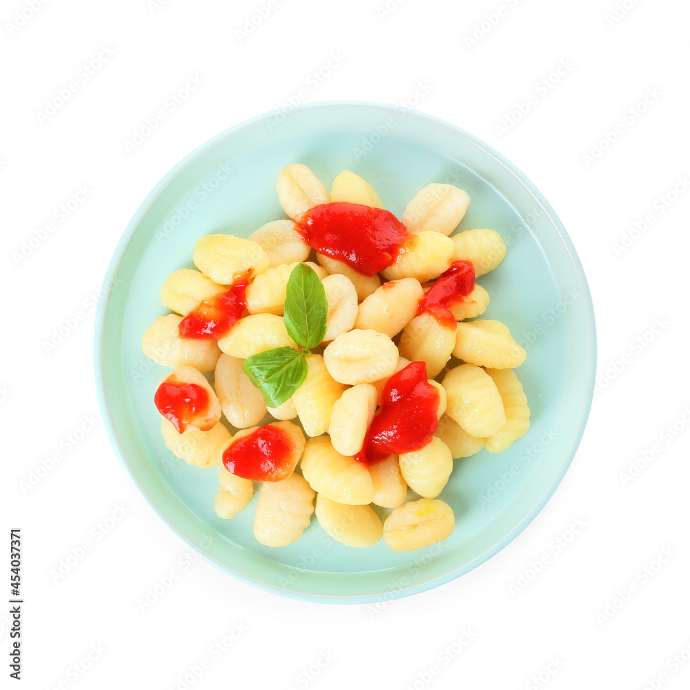 Delicious gnocchi with tomato sauce in plate on white background