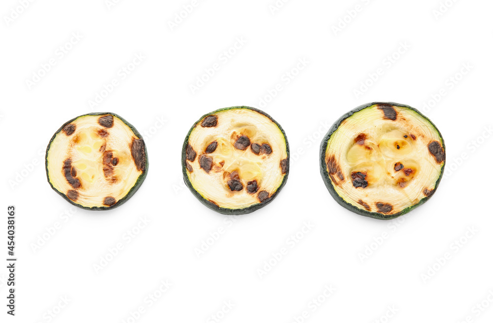 Tasty grilled zucchini on white background