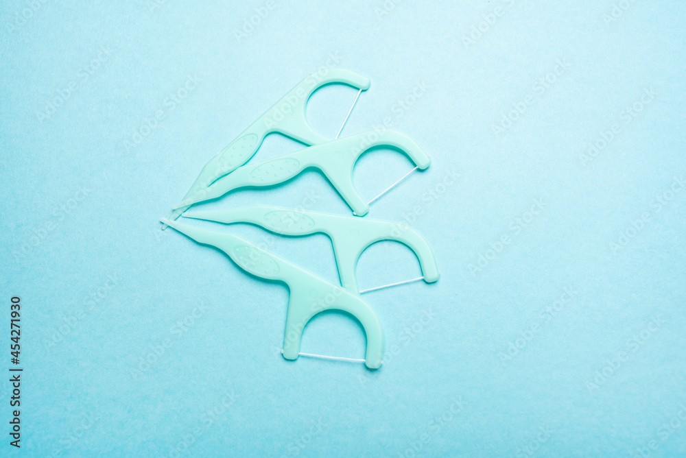 Cleaning teeth supplies dental floss background material