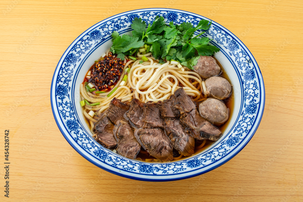 A bowl of spicy beef ramen