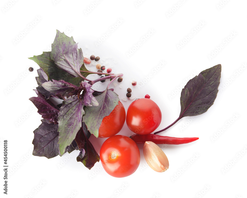 Fresh basil, garlic and tomato on white background