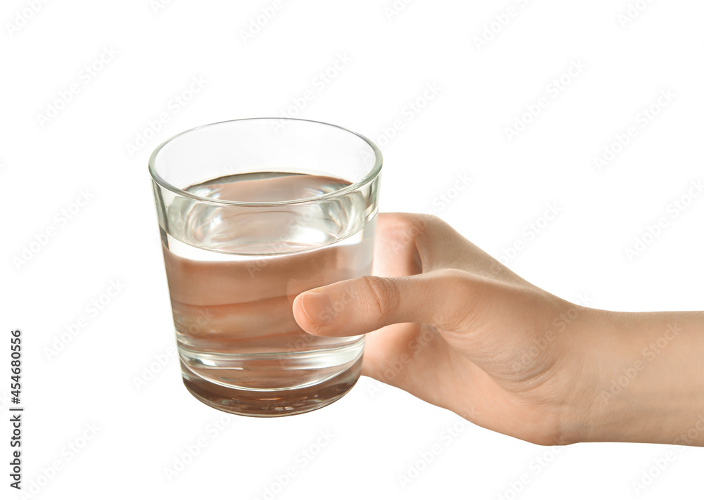 Female hand with glass of water on white background