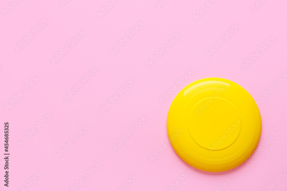 Frisbee disk on color background