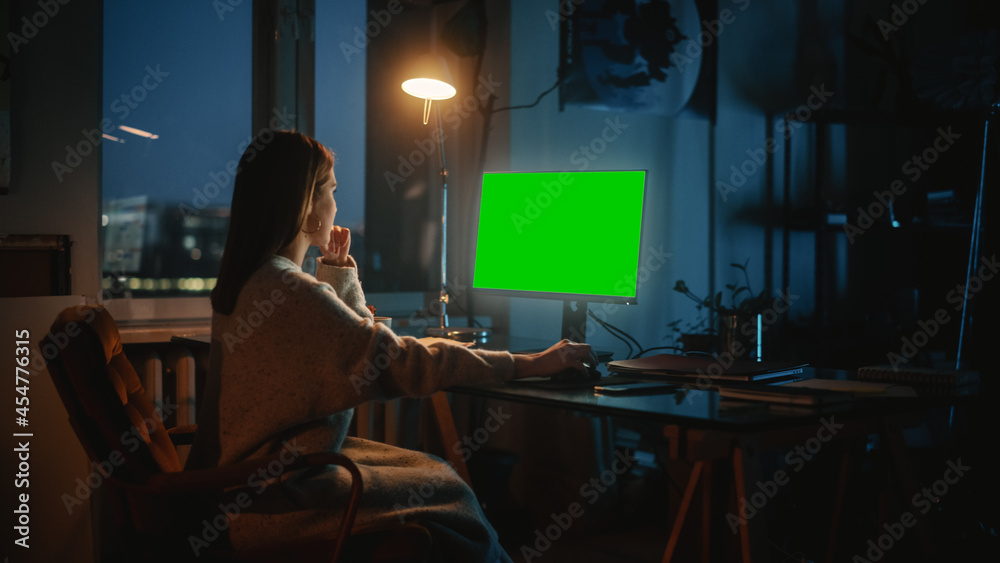 Female Manager Works on a Desktop Computer with Green Screen Chromakey Mock Up in Creative Agency in