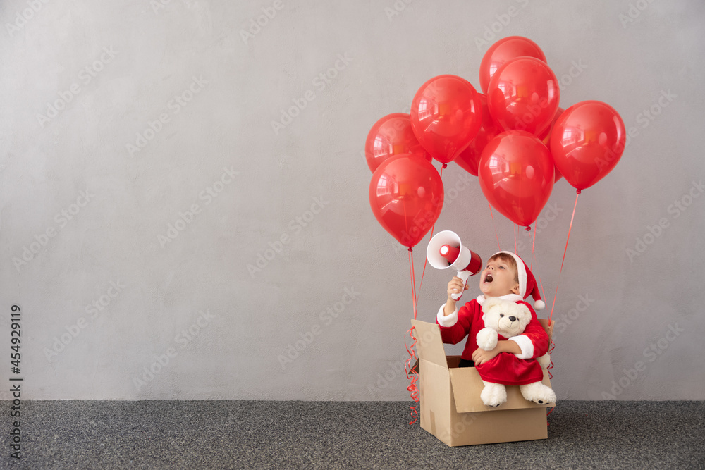 Portrait of happy child wearing Christmas costume