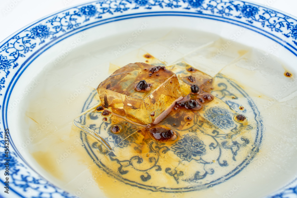 Ice jelly in a bowl on white background