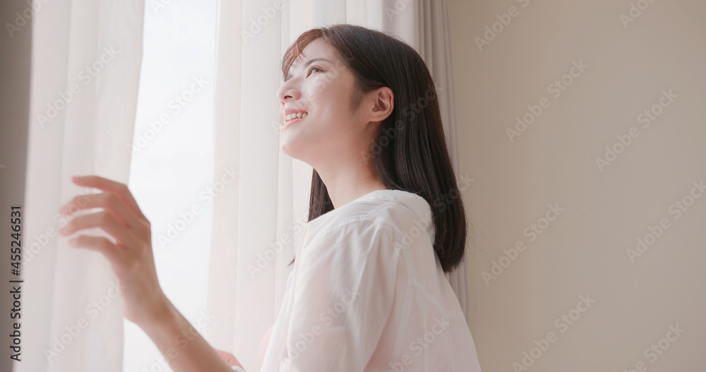 woman looking outside