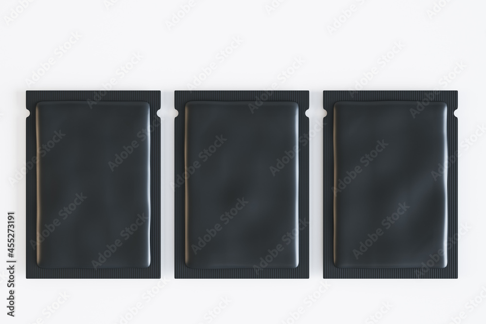 Three empty black product packets on white background. Mock up, 3D Rendering.