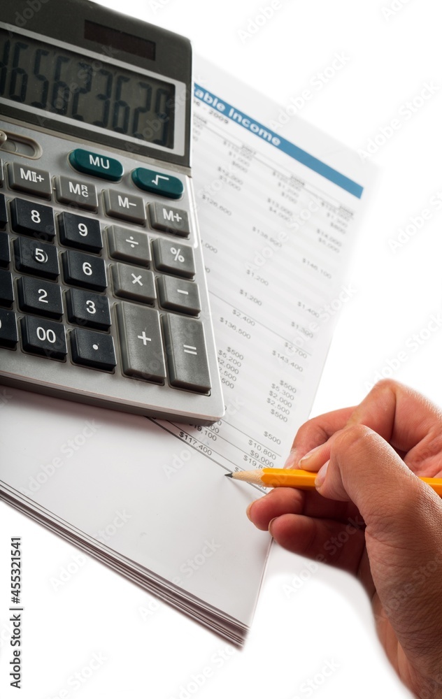 Calculator income statement and pencil