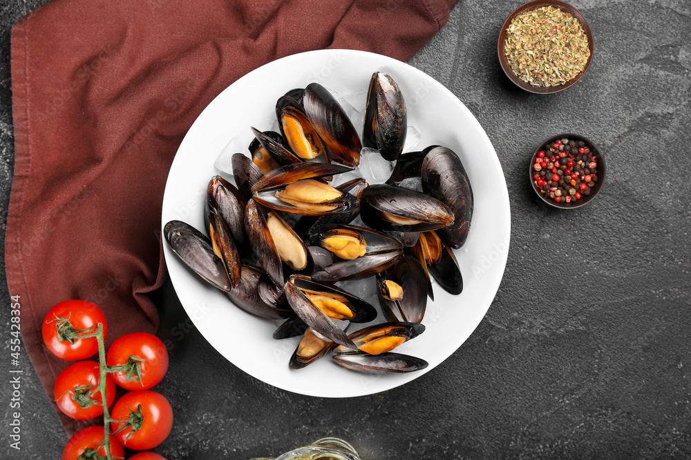 Composition with tasty mussels on dark background