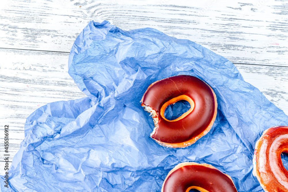 lunch with donuts on wooden table background top view mock up