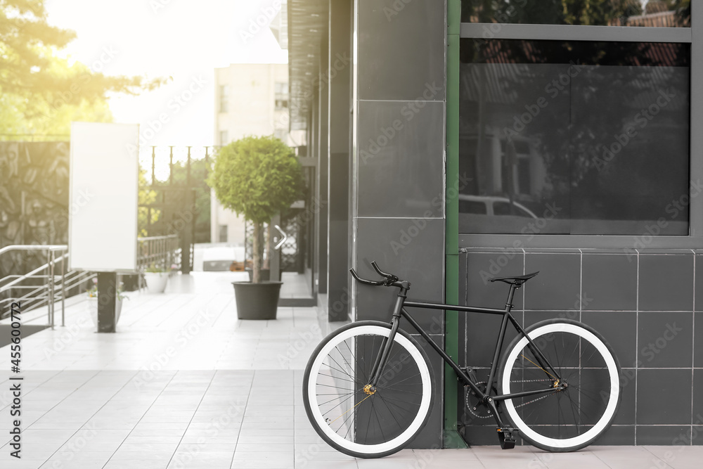 Modern bicycle parked on city street