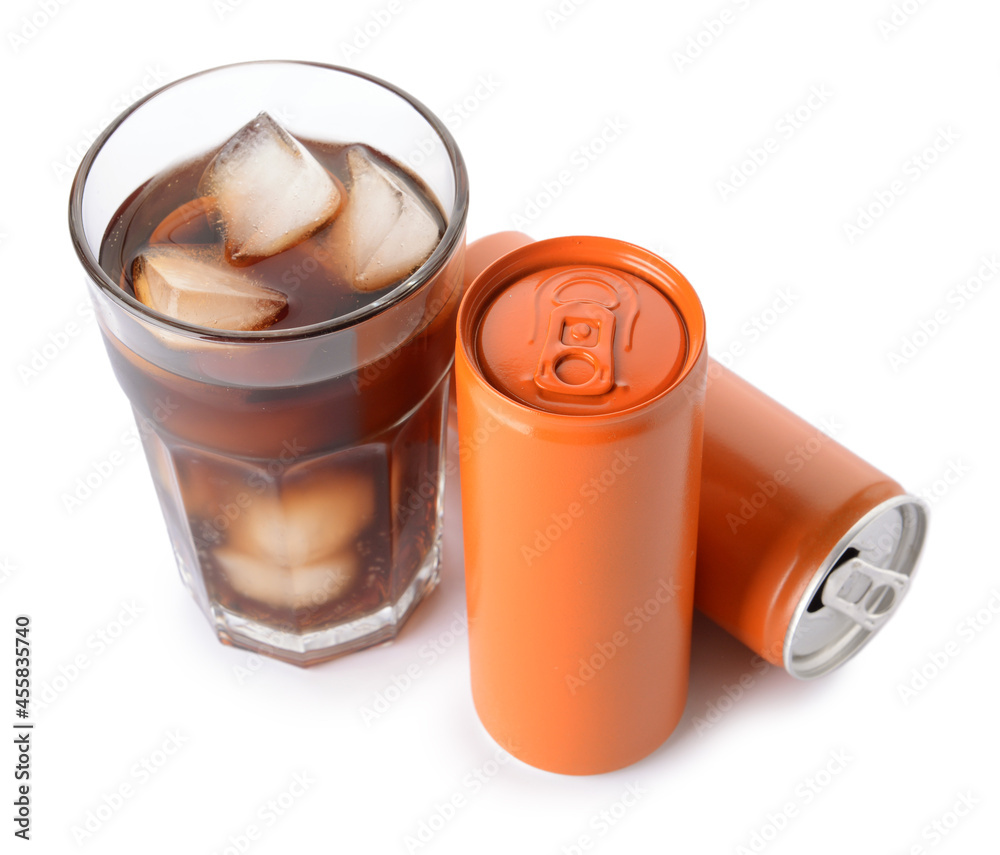 Cans and glass of cold soda on white background