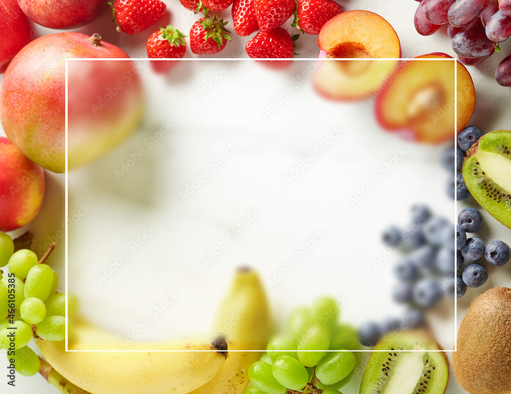 frame of fresh fruit and berries