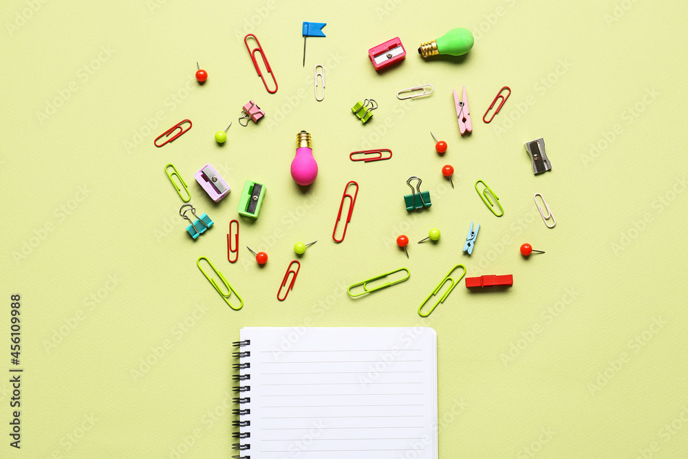 Stationery supplies on color background