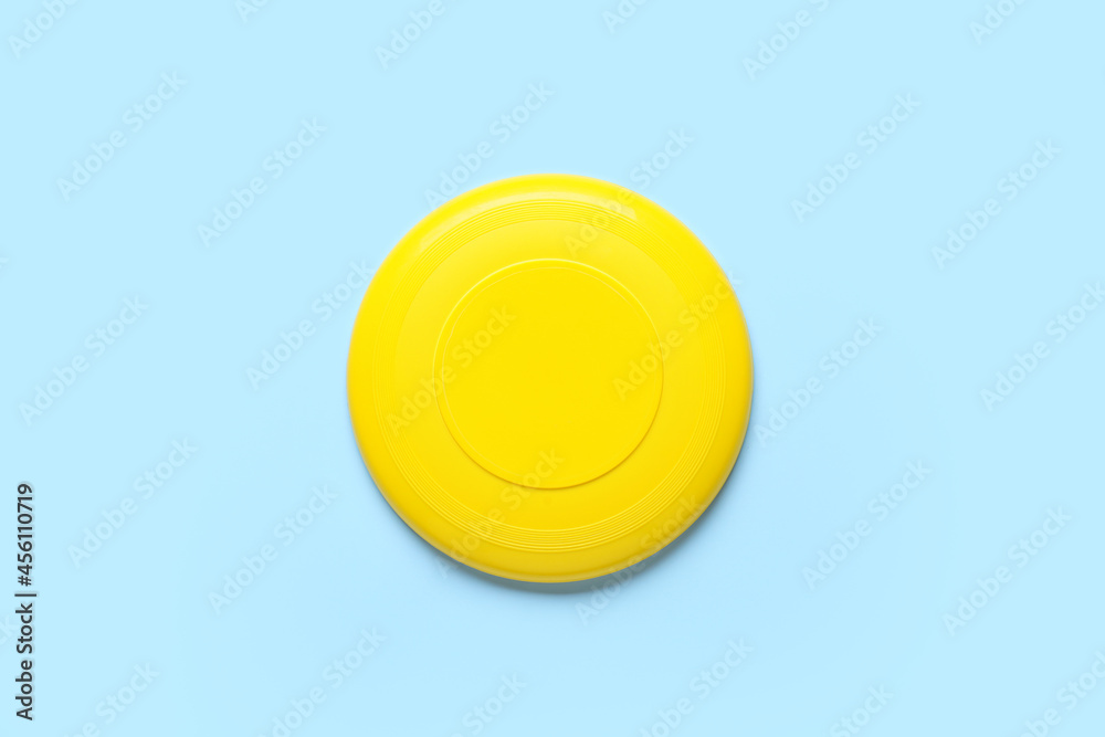 Frisbee disk on color background