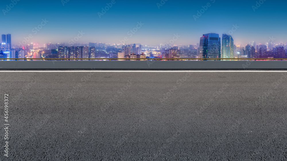 Road and city buildings background