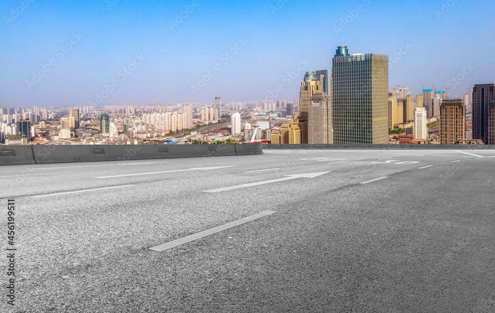 Road and city buildings background