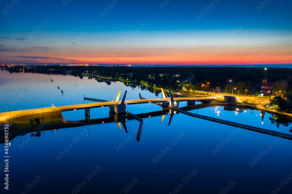 Drawbridge to Sobieszewo Island on the Martwa Wisła river at dusk. Poland