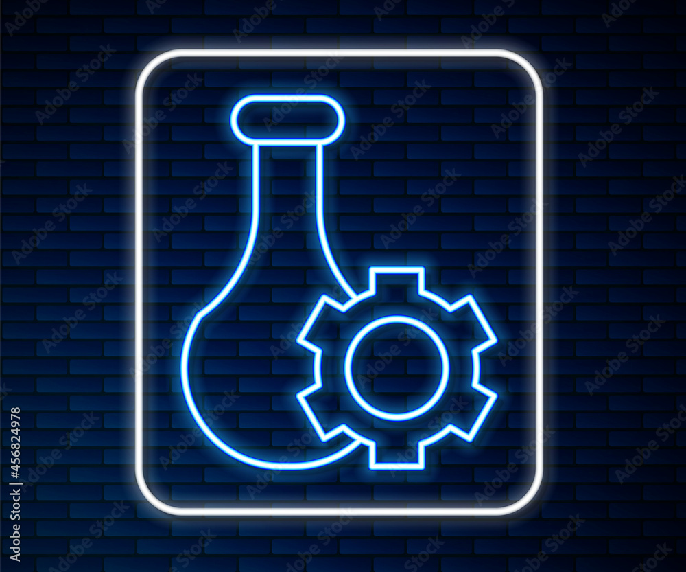 在砖墙背面隔离的发光霓虹灯线试管和烧瓶化学实验室测试图标