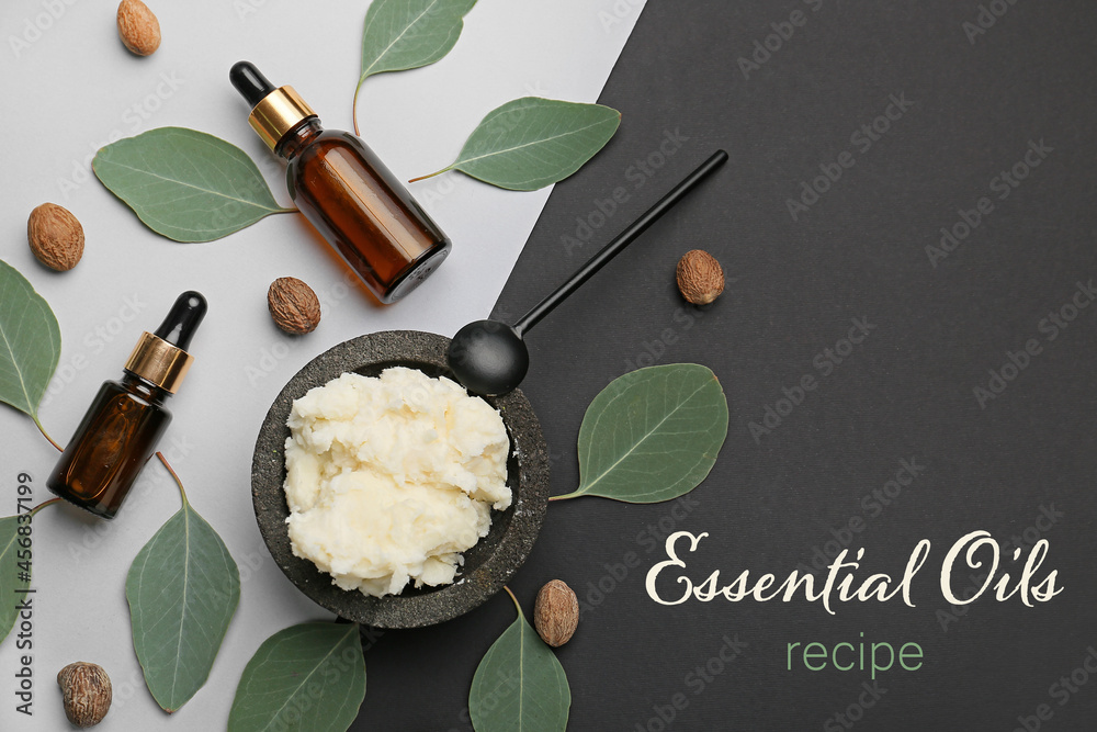 Bottles of healthy essential oil on light background