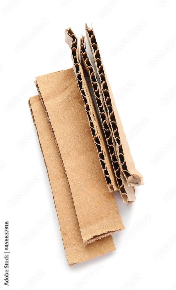 Pieces of cardboard on white background