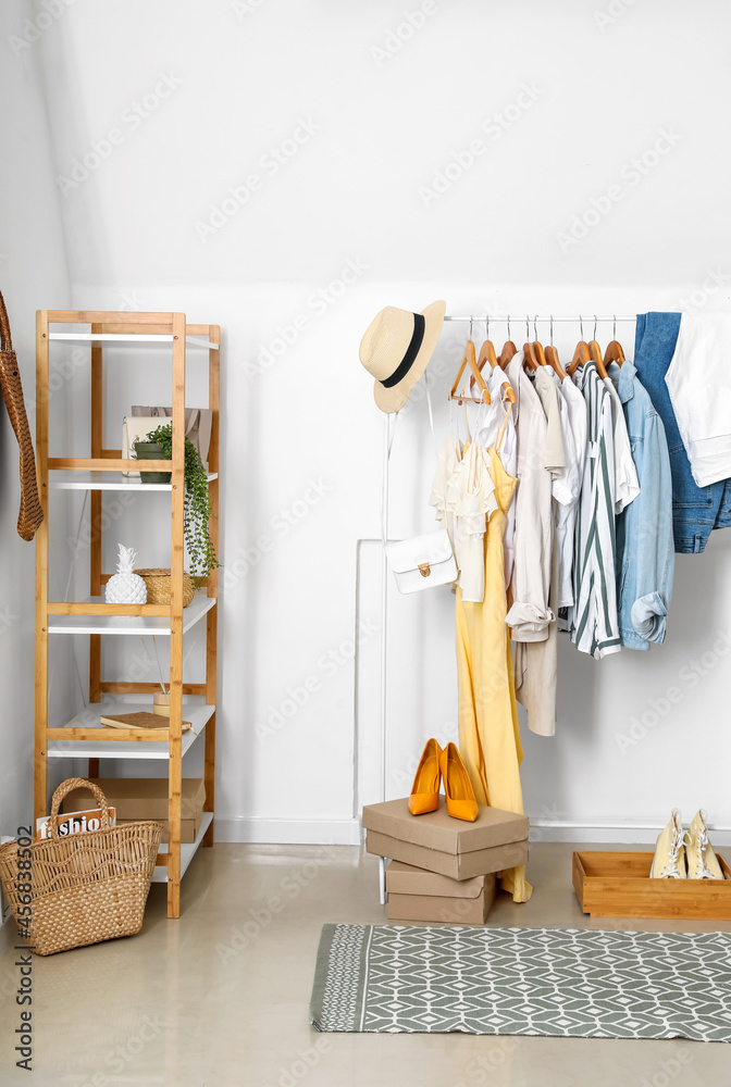 Interior of room with stylish clothes