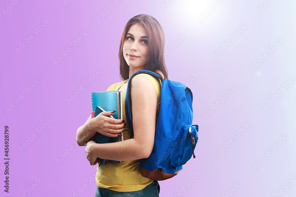 Photo of charming attractive young woman hold textbooks