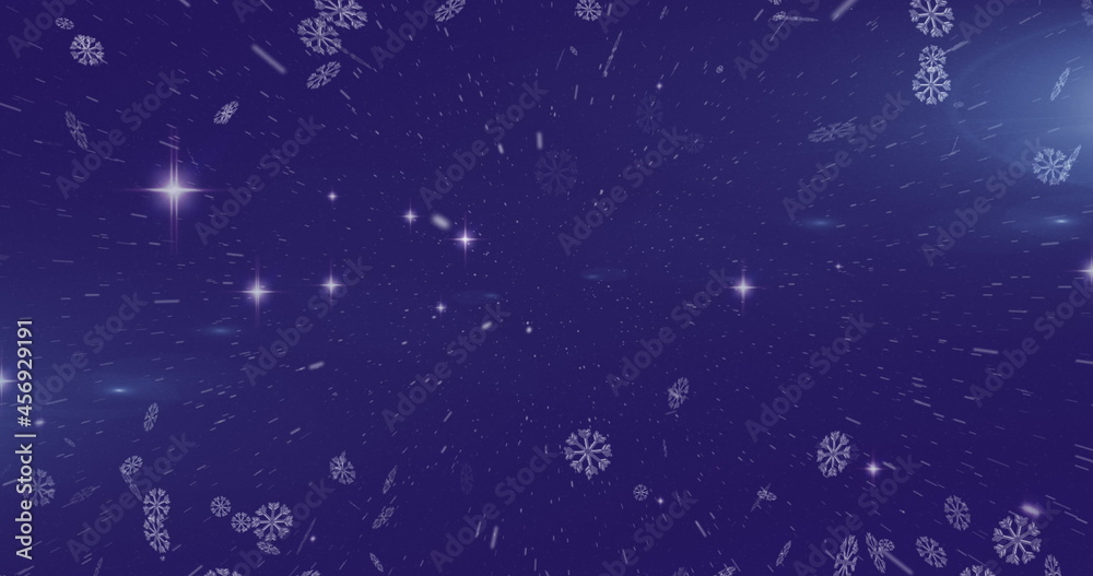 Image of snowflakes falling over glowing purple background