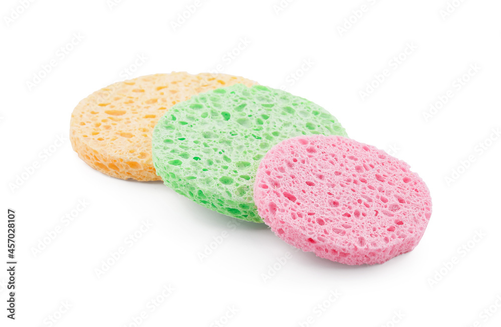 Colorful sponges for makeup cleaning on white background