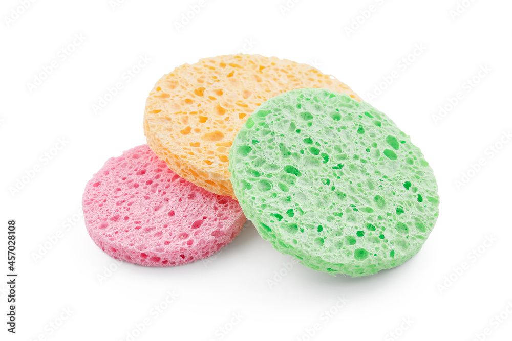 Colorful sponges for makeup cleaning on white background