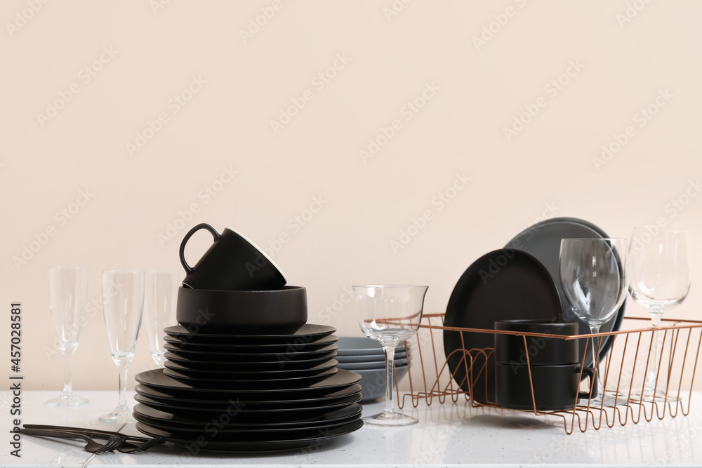 Set of clean dishes on light background