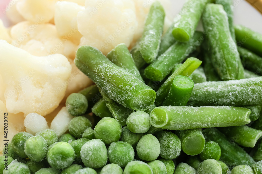 Different frozen vegetables as background, closeup