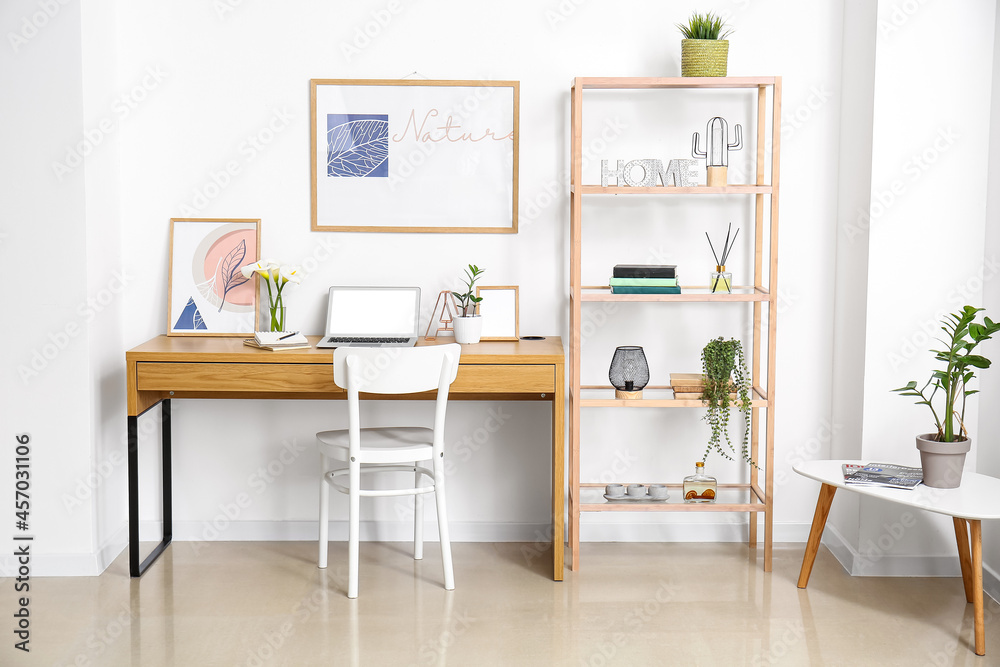 Interior of stylish room with modern workplace