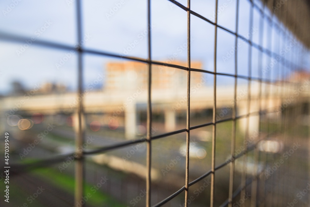 Black Aluminum Fence on city background