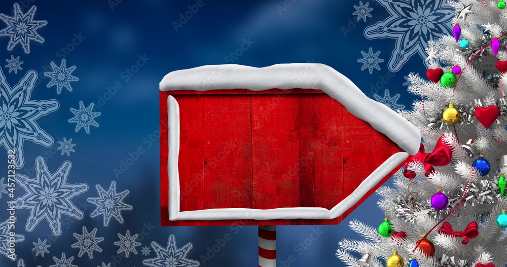 Image of winter scenery landscape with red sign and decorated christmas tree on blue background