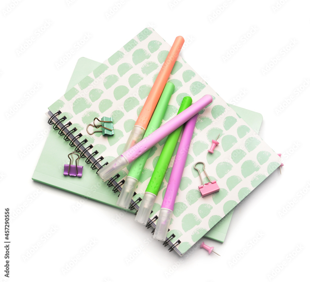 Different stationery supplies on white background