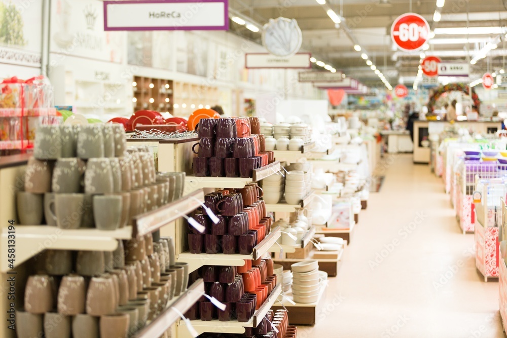 supermarket interior with collection of ceramic and tableware