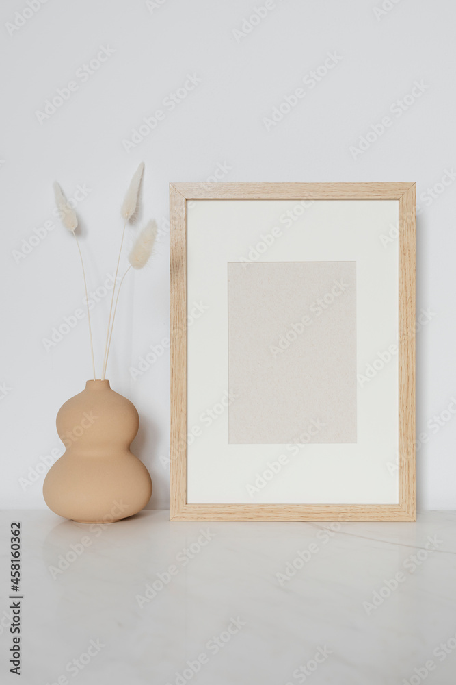 Rectangle wooden photo frame on the floor