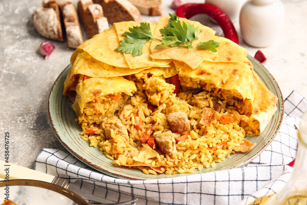 Plate with tasty Shah Pilaf on table