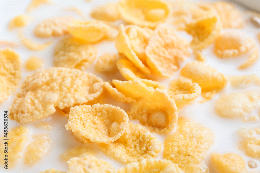 Tasty cornflakes with milk, closeup