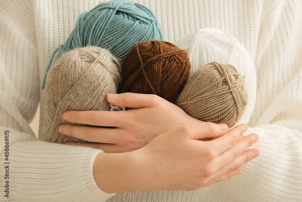 Woman with knitting yarn, closeup