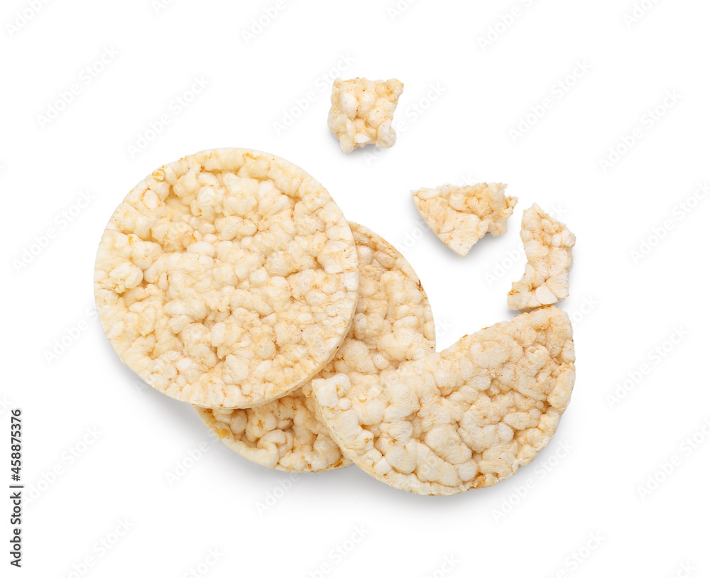 Puffed crispy rice crackers on white background