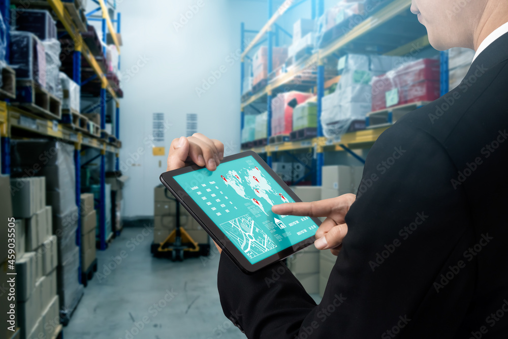 Warehouse management innovative software in computer for real time monitoring of goods package deliv