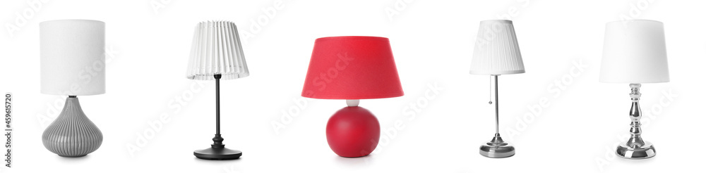 Stylish table lamps on white background