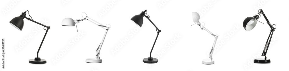 Stylish table lamps on white background