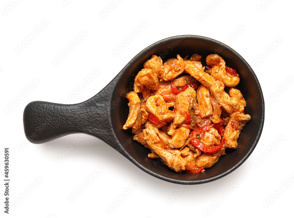 Delicious chicken Fajita in frying pan on white background